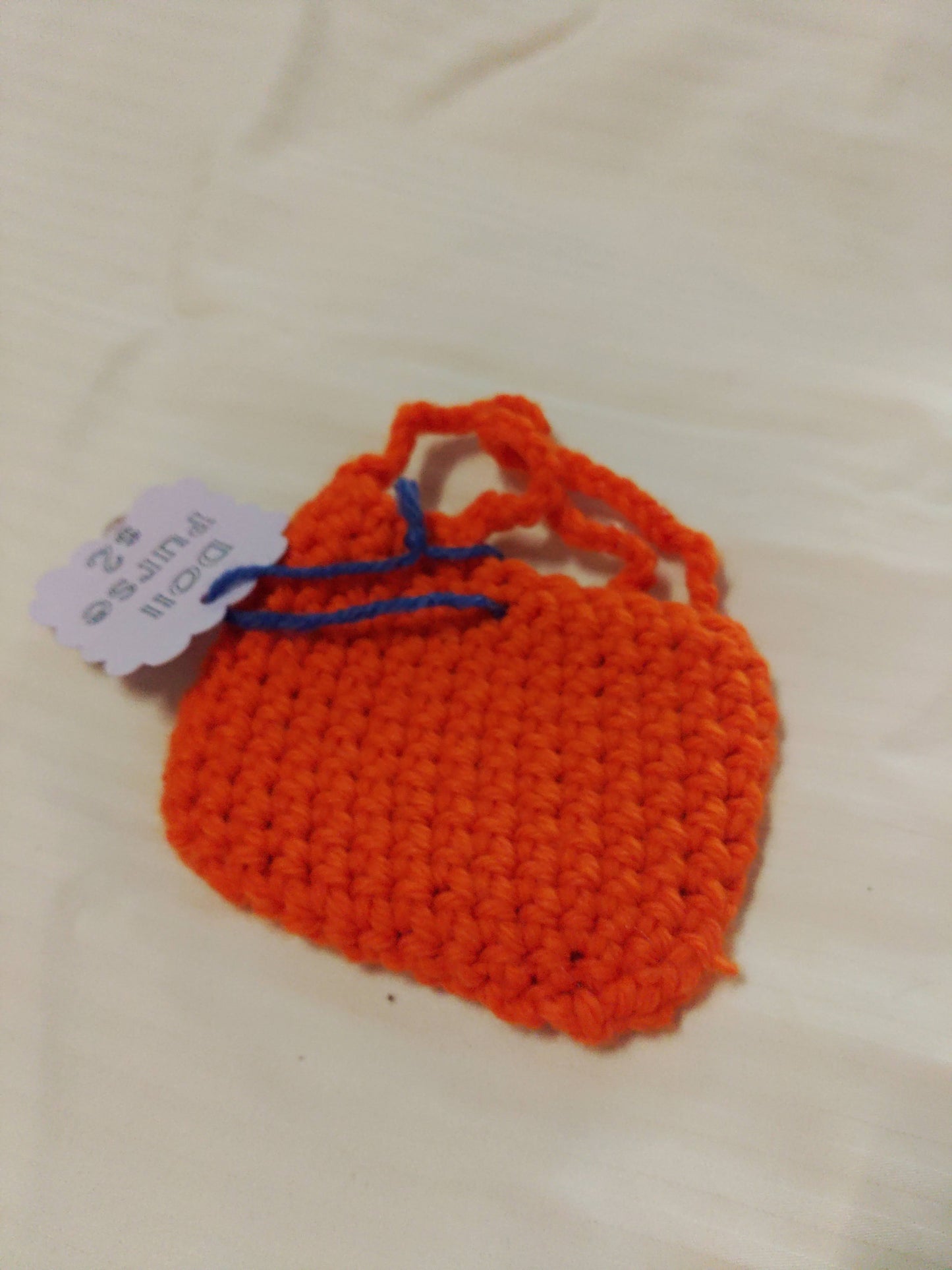 Orange purse for doll