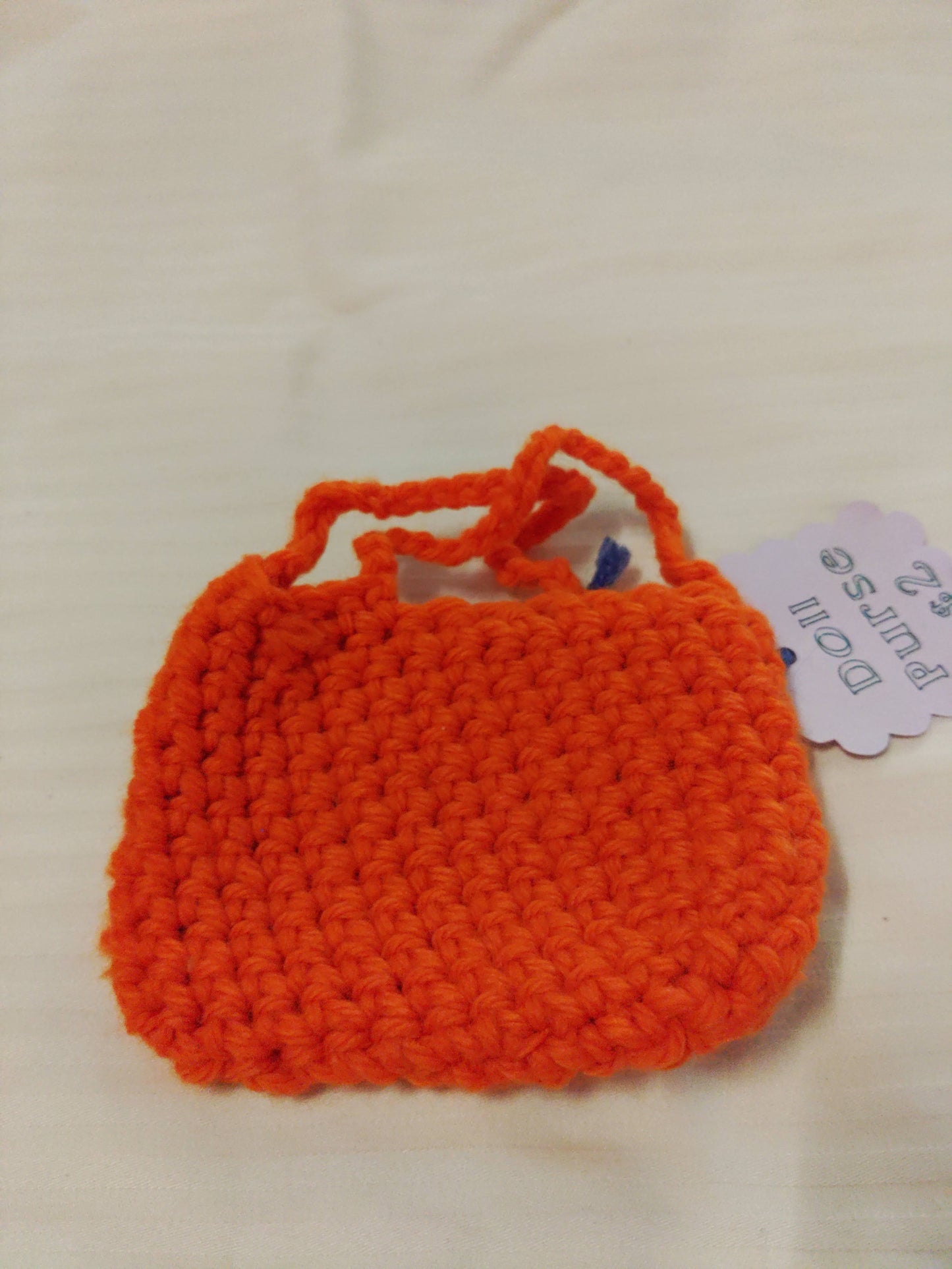 Orange purse for doll